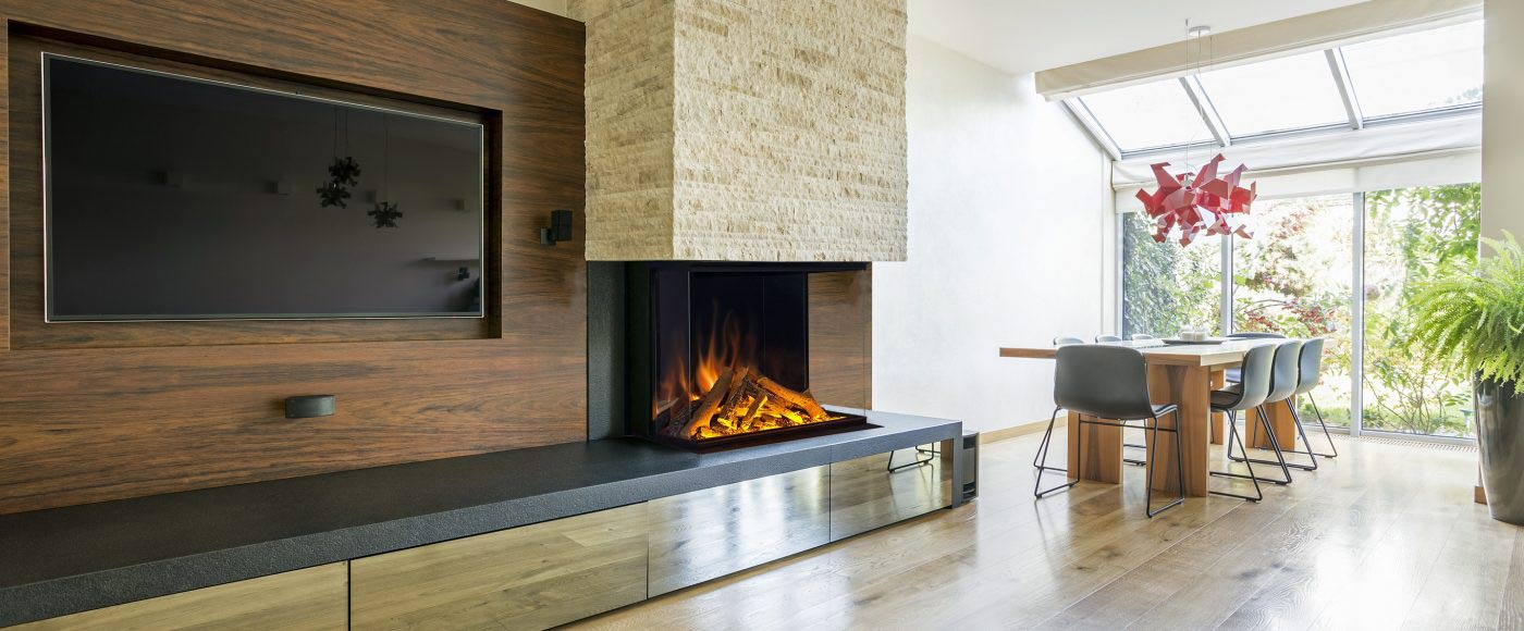 A wide contemporary electric fire set into a wall