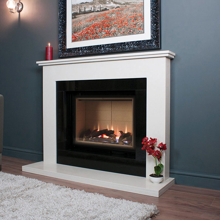 A stone fireplace with a log-effect fire